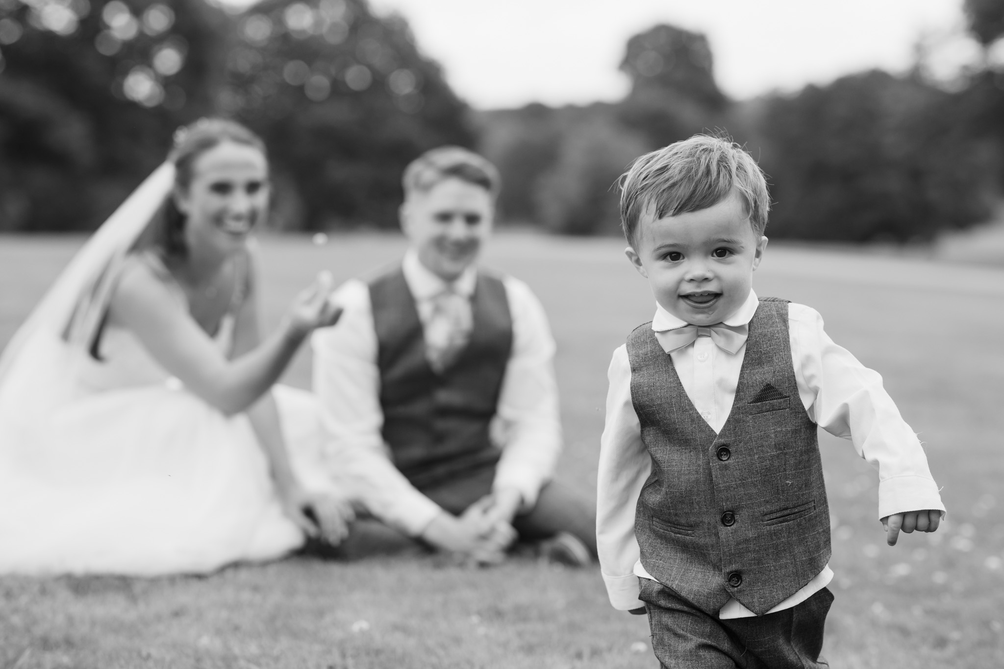 Bride and Groom with Son at night at Rudding Park
