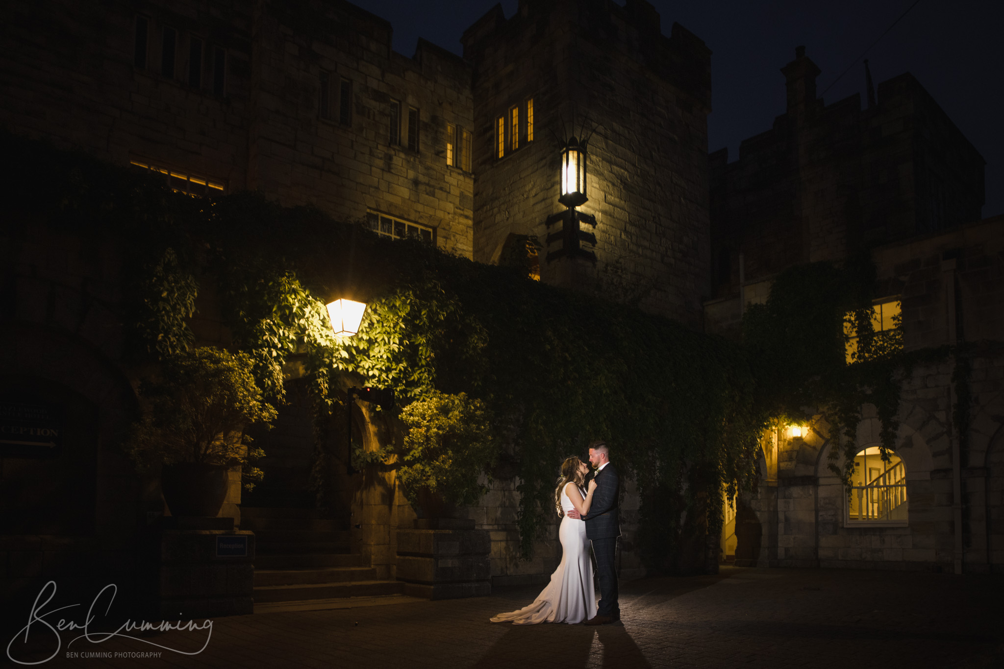 Bride and groom in the courtyard at Hazlewood Castle