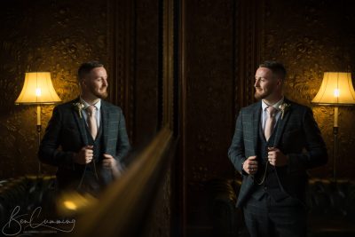 Reflection of the groom at Hazlewood Castle