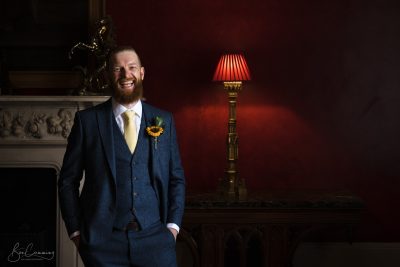 Groom laughing at Allerton Castle