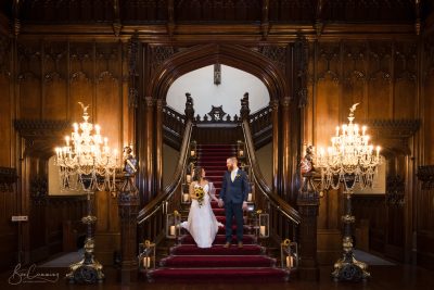 Bride and Groom on the beautiful staircase at Allerton Castle