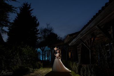 Bride and Groom Pose at night at the Chevin Country Hotel