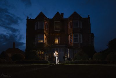 Bride and Groom at night outside Goldsborough Hall