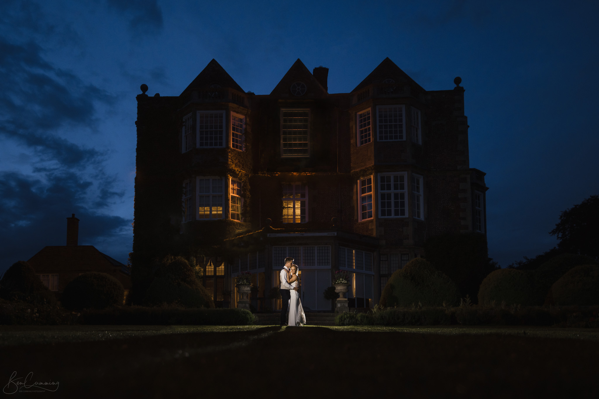 Bride and Groom at night outside Goldsborough Hall